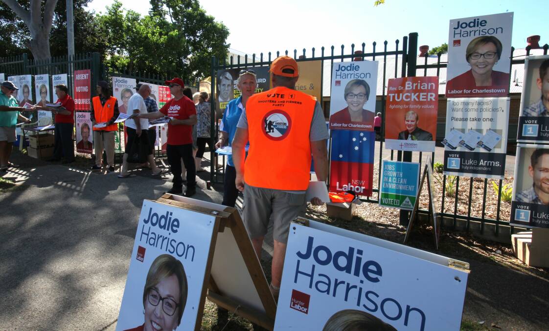The polling action from Charlestown Public School earlier today. Picture: Phil Hearne