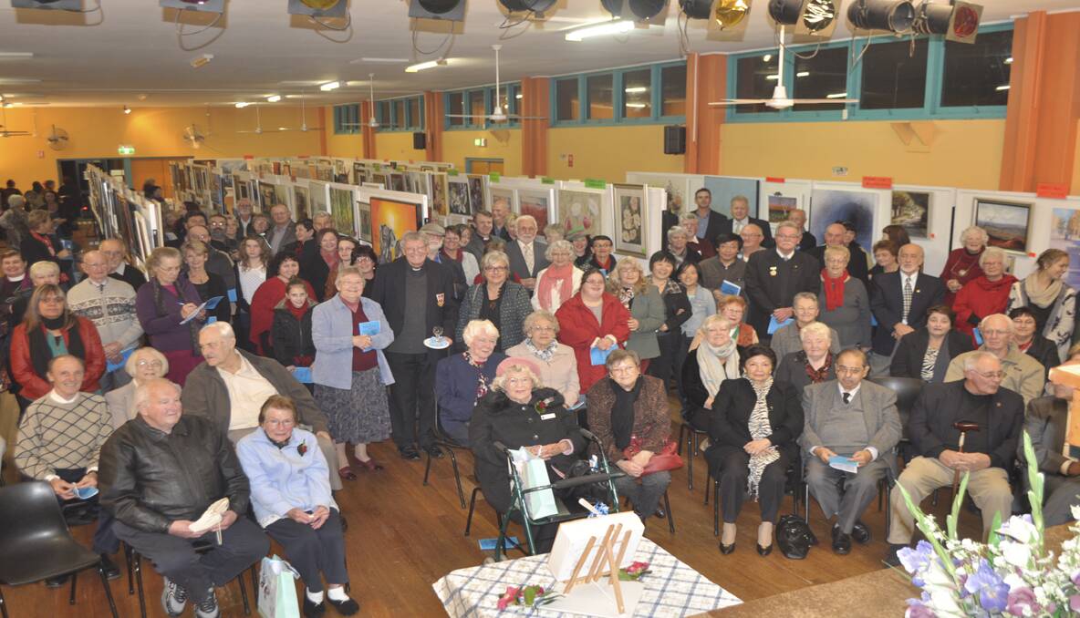 More than 100 guests packed Weston Civic Centre on Tuesday evening for the official opening of the 50th annual Weston Art Show. 