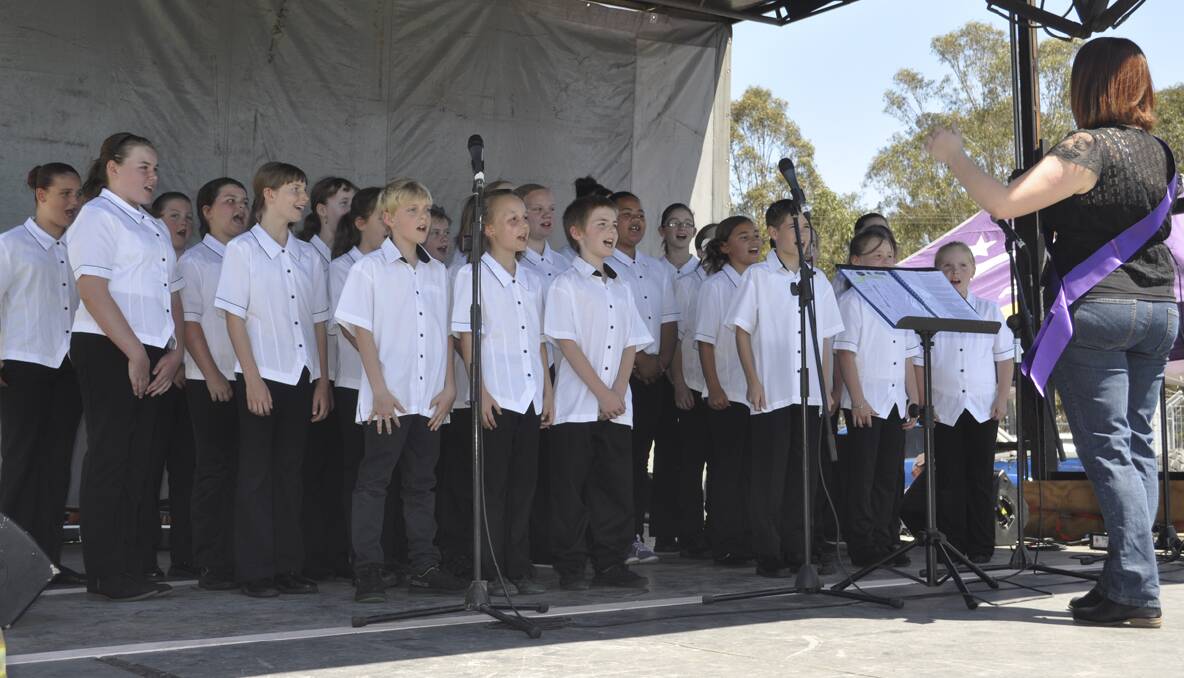 CESSNOCK RELAY FOR LIFE 2013: The Cessnock Community of Great Public Schools choir, led by Annie Devine, performed at the Relay. Photo: The Advertiser.
