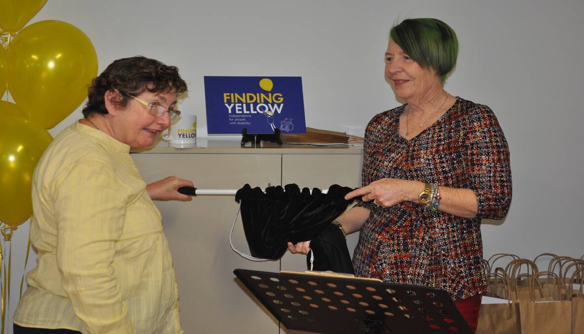 HAPPY: Mary Hovey and patron Louise Selmes unveiling the new name for Cessnock Hostel – Finding Yellow.