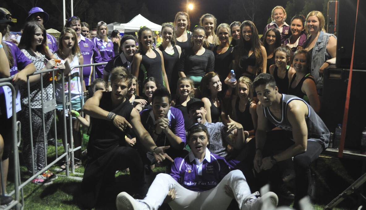 CESSNOCK RELAY FOR LIFE 2013: The Collective with some fans after their performance at Cessnock Relay For Life. Photo: The Advertiser.