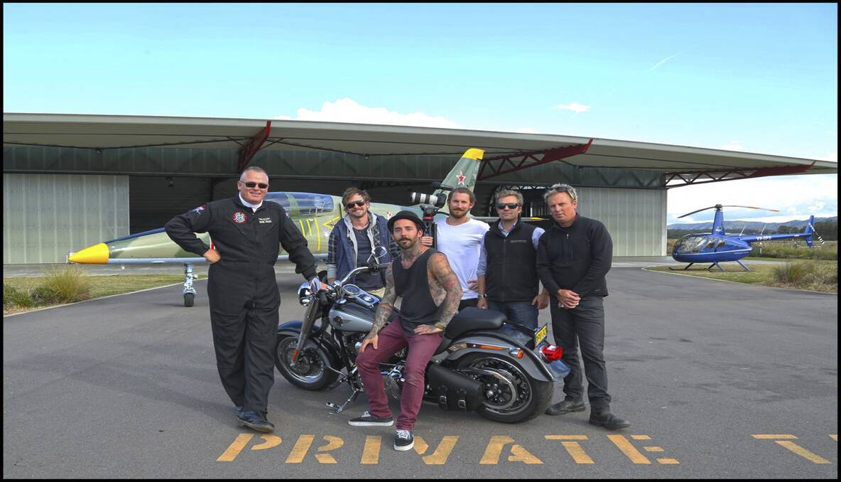 ADVENTURE: Hunter Valley Jetride pilot Mark Pracy; WINERAM directors Rupert Critchley, Casey Grant (front) and executive producer and presenter Colin West; Brokenwood Wines senior winemaker Simon Steele and helicopter pilot Luke Davidson. Photo by Casey Harrison.