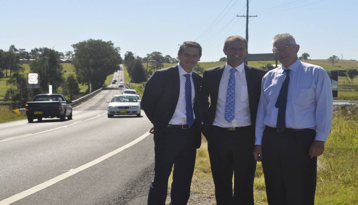 PROBLEM AREA: Shadow Minister for Roads Ryan Park, Member for Cessnock Clayton Barr and Mayor of Cessnock Bob Pynsent at Testers Hollow, which was closed for over a week when it flooded in March this year.