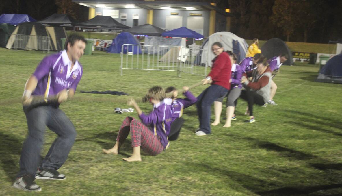 CESSNOCK RELAY FOR LIFE 2013: Action from the midnight tug-o-war. Photo: Lauren Woolley.