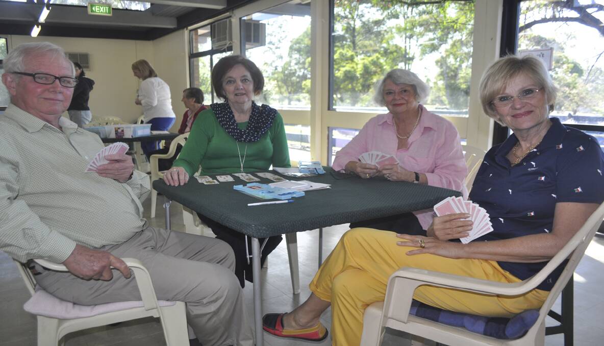 ACTIVE: Cessnock Bridge Club master point secretary and director Jim Fitzgerald, Pauline McCabe, director and vice president Norma Byrne and Ellie Fitzgerald, keeping their minds sharp with a fun game of bridge.