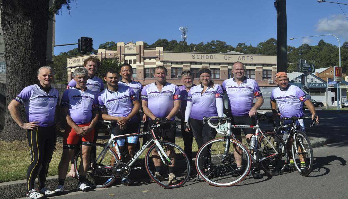 REST STOP: Pictured at Cessnock is Bridge to Bridge cycle charity riders (from left) Peter Crowther, Ivor Ablitt, Alex Stevensen, Robert McGlinn, Kev Ahn, Mark Driver, Randal Bishop, Lauren Porter, Andrew Crowther and Lawrie Ward.
