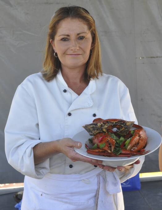 CESSNOCK RELAY FOR LIFE 2013: Charlie McLennan with her winning dish, the Thai chilli mudcrab. Photo: The Advertiser.