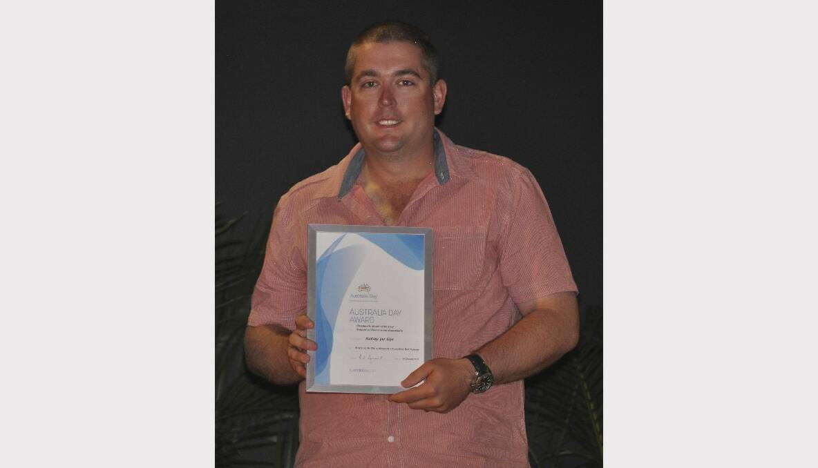 Cessnock Relay For Life chairman Ben Woolley with the relay's Community Event of the Year award.