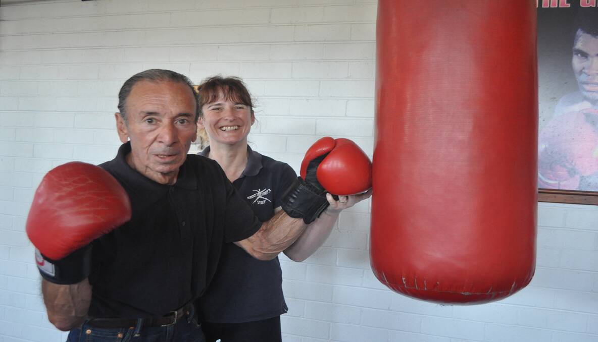 Integrated Living Dementia Advisory Service client Manuel Damian with Total Fitness owner and trainer Allayne Rohr, during a boxing session at the gym. 