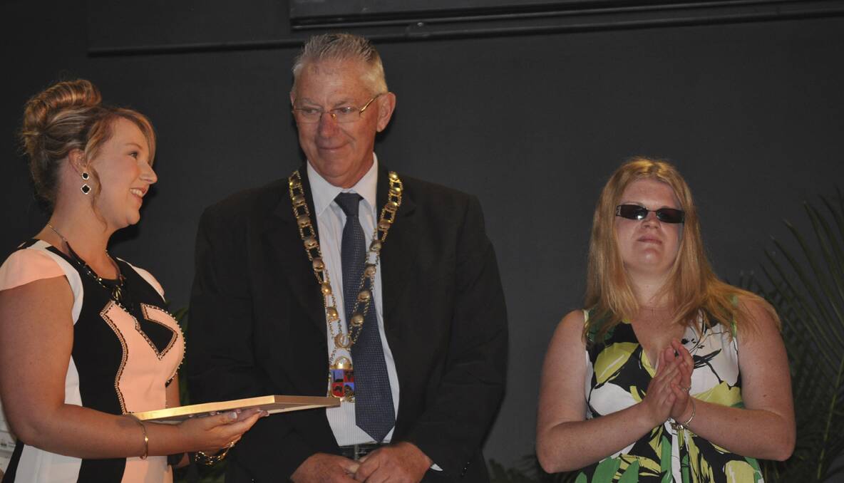 Hayley Doherty receives her appreciation award from Cessnock Mayor Bob Pynsent and ambassador Krystel Keller.