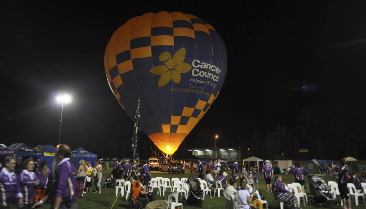 CESSNOCK RELAY FOR LIFE 2013: Wine Country Ballooning's Cancer Council hot air balloon made a surprise appearance at the candlelight ceremony. Photo: The Advertiser.