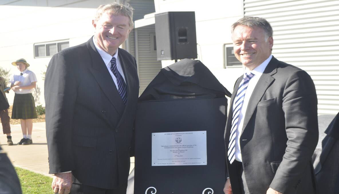Principal Malcolm Bromhead and Member for Hunter, Mr. Joel Fitzgibbon, unveiling the school plaque. 