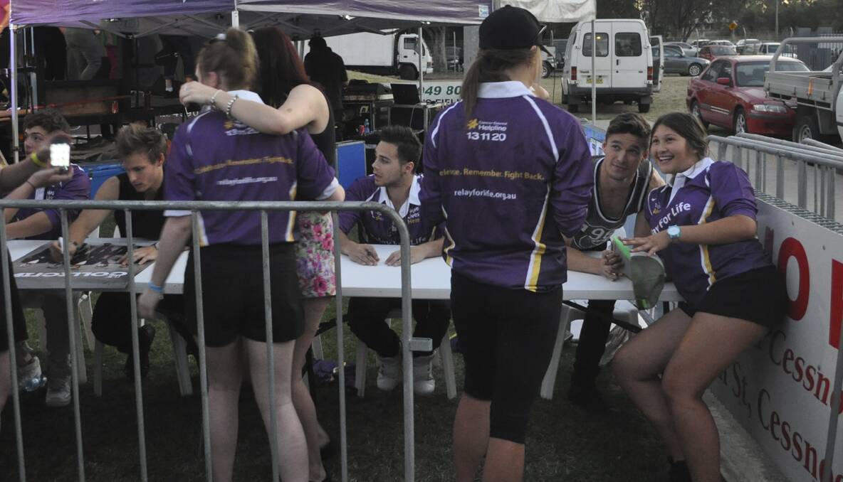 CESSNOCK RELAY FOR LIFE 2013: The Collective signed autographs after their performance. Photo: The Advertiser.