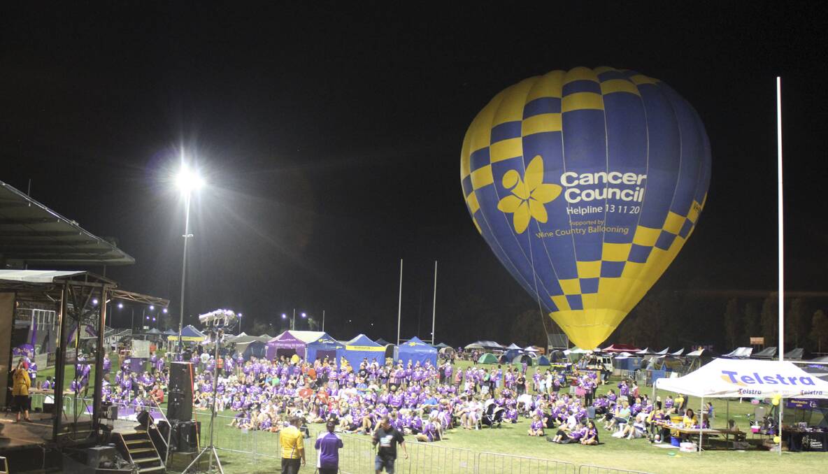 CESSNOCK RELAY FOR LIFE 2013: Wine Country Ballooning's Cancer Council hot air balloon made a surprise appearance at the candlelight ceremony. Photo: Lauren Woolley.