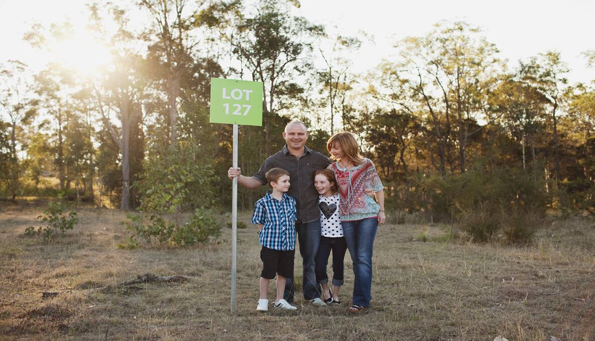 SOLD: Mike and Toni Stewart and their children Kade and Ryley, Huntlee’s first land buyers. Photo by Hannah Rose Robinson.