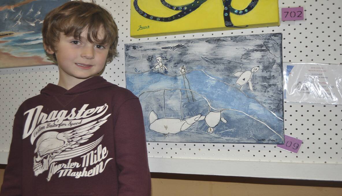 Artist Rylan Staley with his piece 'Bird Talk', winner of the Junior Youth Award. 