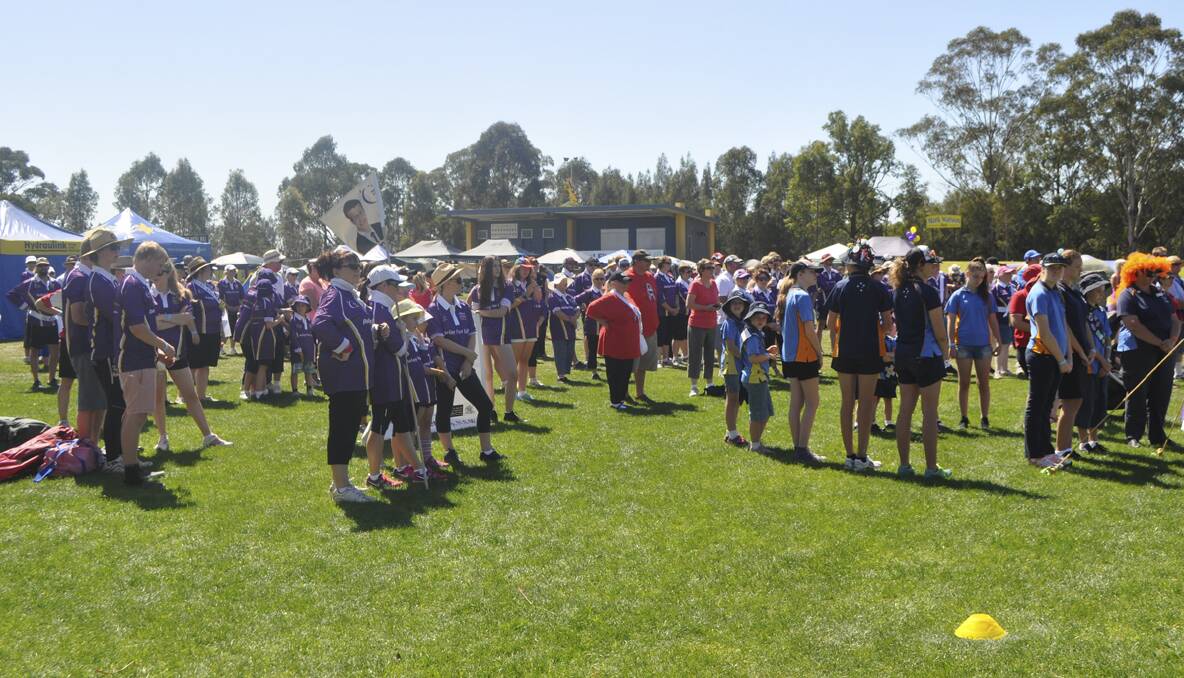 CESSNOCK RELAY FOR LIFE 2013: Relayers gather for the opening ceremony at Baddeley Park. Photo: The Advertiser.