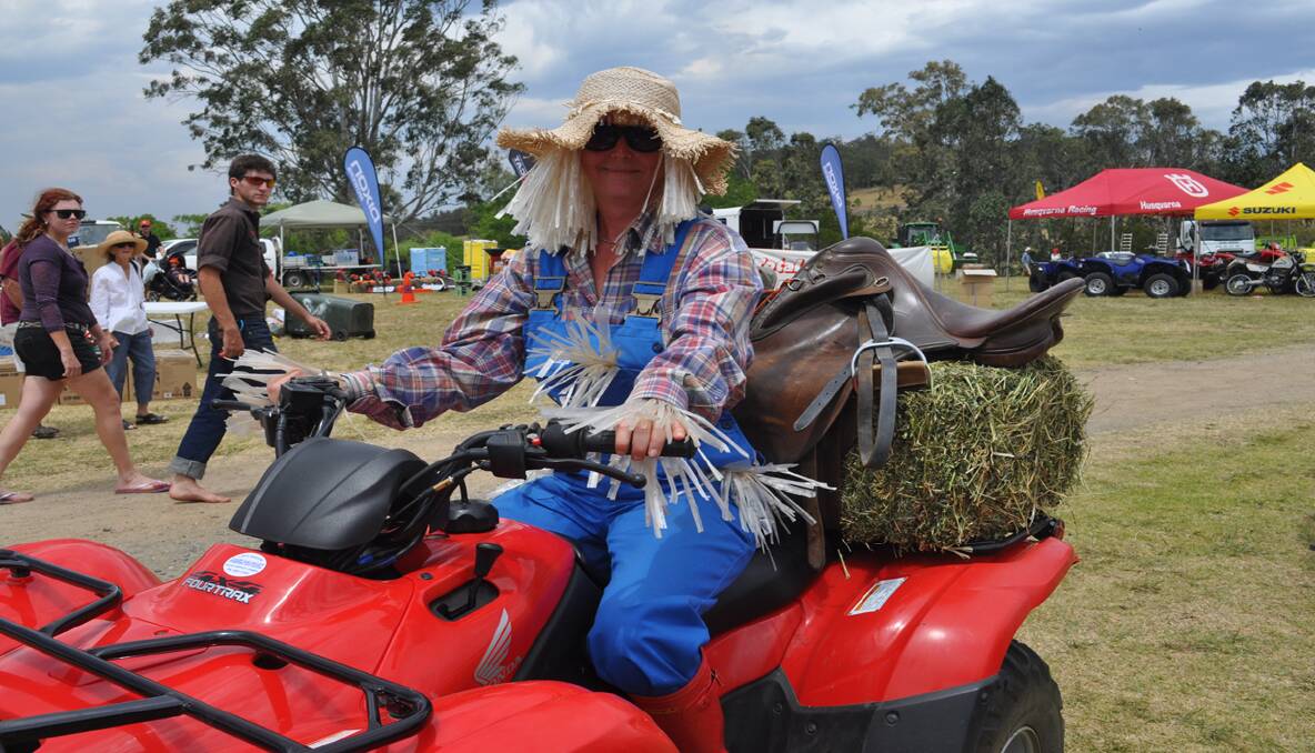 Lily McCall of Wollombi on her scarecrow-themed mower.