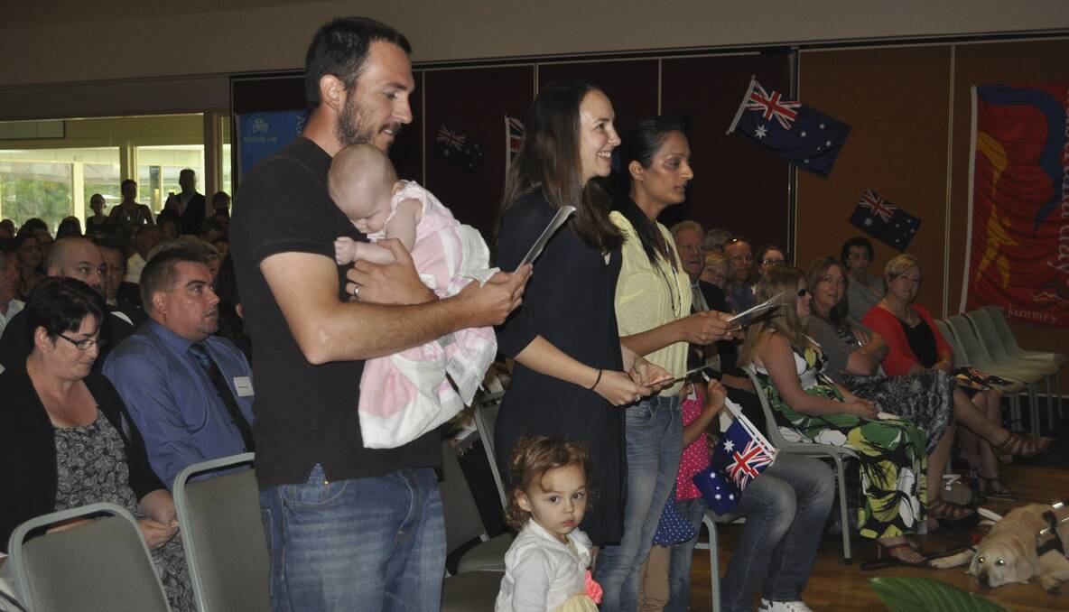 Some of the 24 new Australian citizens that took part in the naturalisation ceremony.