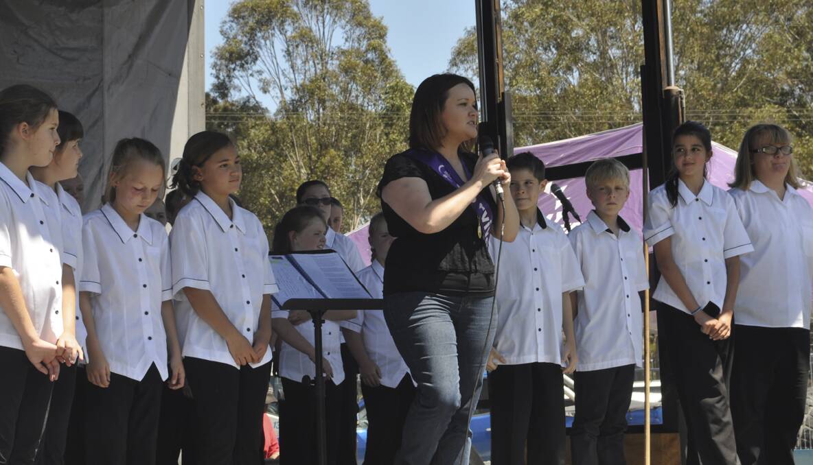 CESSNOCK RELAY FOR LIFE 2013: The Cessnock Community of Great Public Schools choir, led by Annie Devine, performed at the Relay. Photo: The Advertiser.