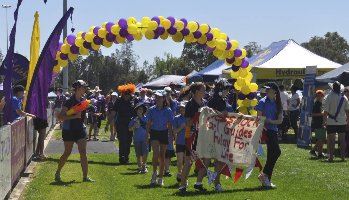 CESSNOCK RELAY FOR LIFE 2013: The relay gets underway and all teams join in. Photo: The Advertiser.