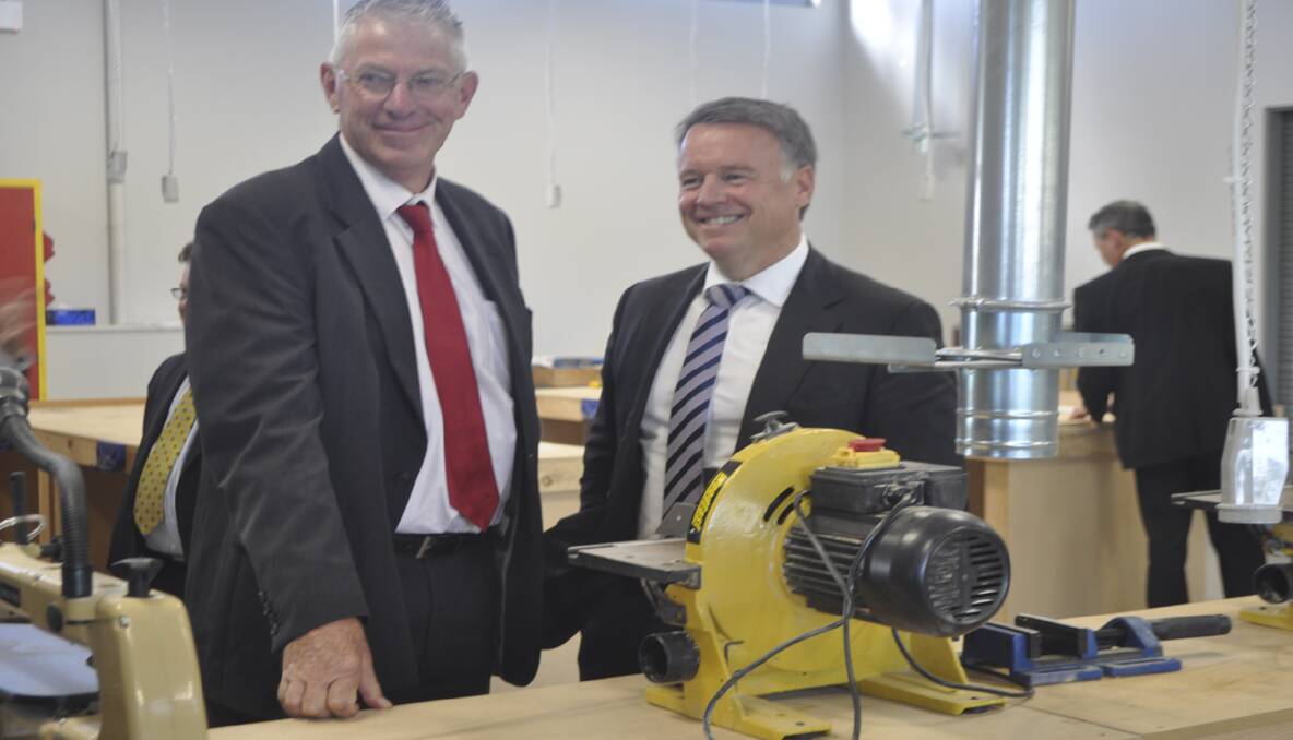 Mayor of Cessnock, Cr. Bob Pynsent and Member for Hunter, Mr. Joel Fitzgibbon on a tour of the school's new Trade Training Centre. 