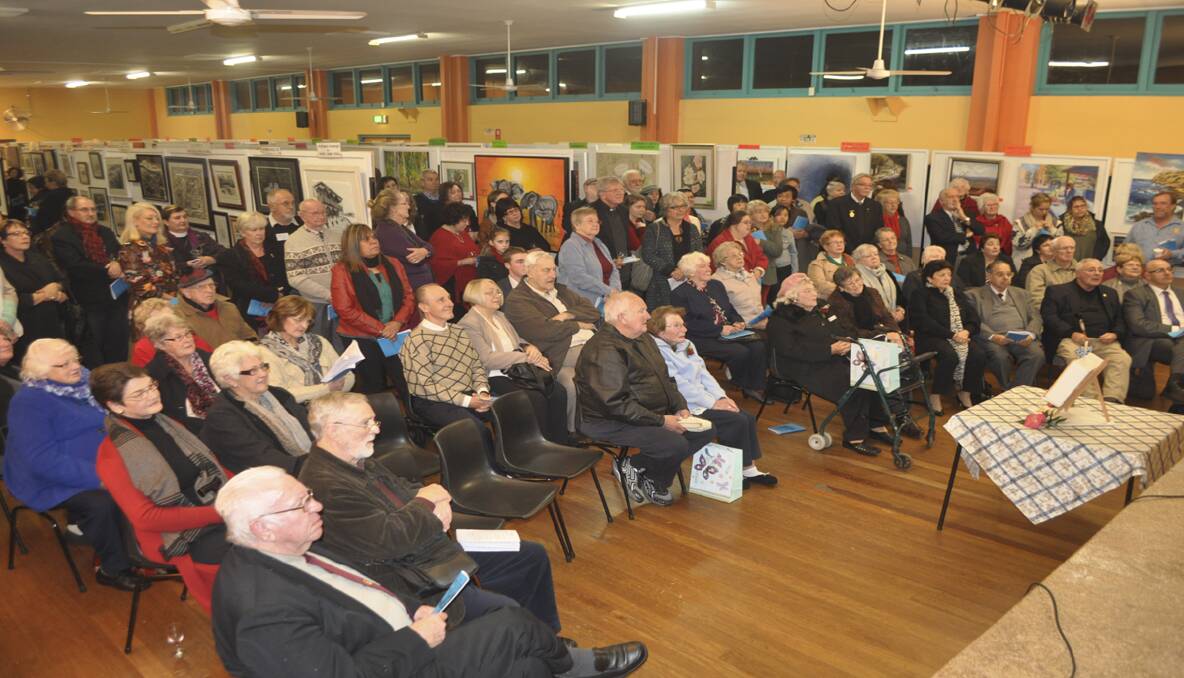 More than 100 guests packed Weston Civic Centre on Tuesday evening for the official opening of the 50th annual Weston Art Show. 