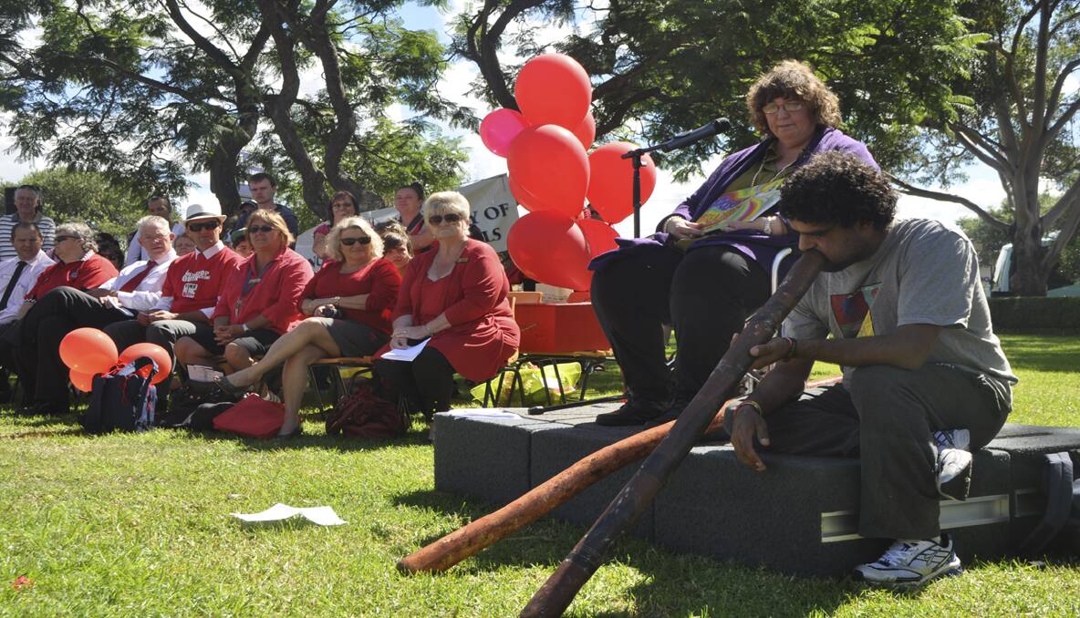 Author Krysten Walker Cox read from her book, Didgeridoo Dreaming and Maurice Perry played the didgeridoo in the Cessnock TAFE grounds.