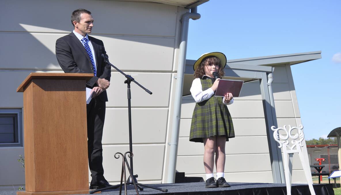 St Philip's student Ruby Baker presents the Acknowledgement of Country with Deputy Principal, Mr Darren Cox. . 