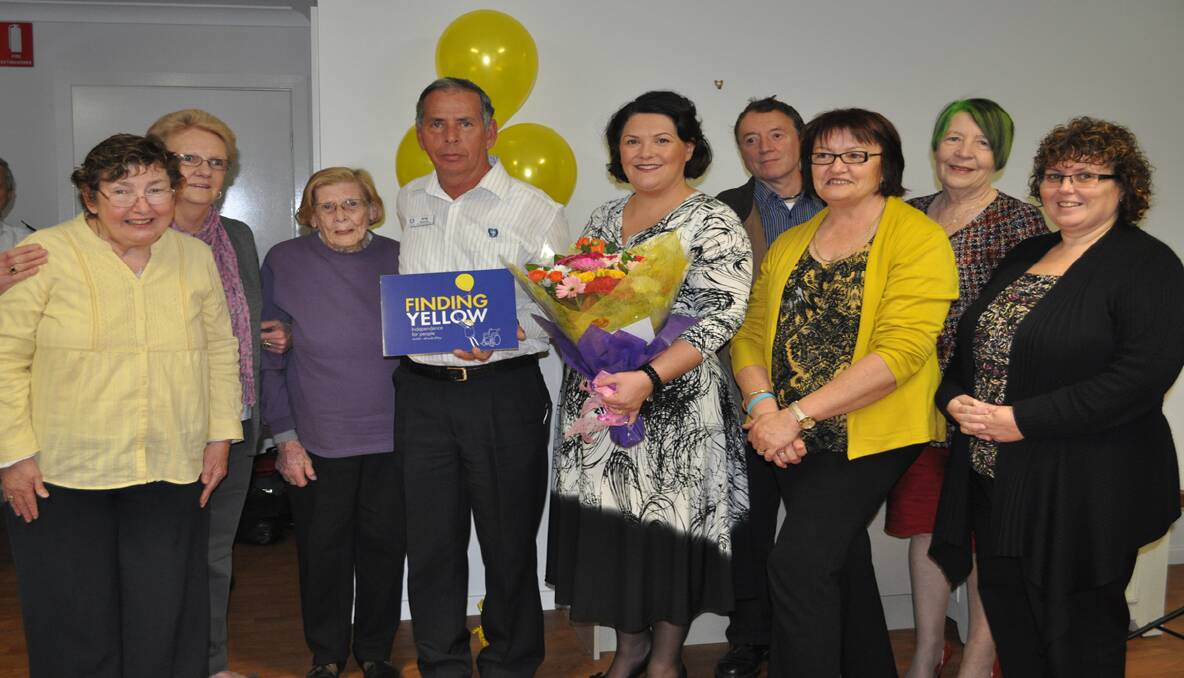 NEW DIRECTION: Celebrating the official unveiling of ‘Finding Yellow’, Mary Hovey, secretary Jan Brien, Una Reid, chairperson Greg Burgoyne, 2HD presenter and special guest Meryl Swanson, Caiman Rea, service manager Jenny Field, patron Louise Selmes and vice-chairperson Michelle Rule.