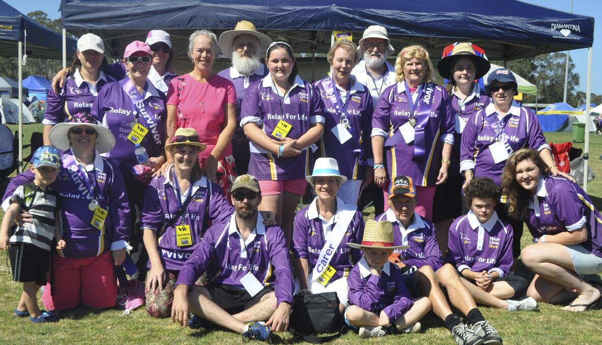 CESSNOCK RELAY FOR LIFE 2013: The Passion For Life team, comprising members of Cessnock Breast Cancer Support Group and their families. Photo: The Advertiser.