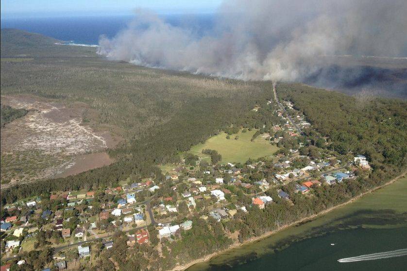 The fire near Forster last week burnt out 78 hectares - and conditions are expected to worsen across the state on Tuesday. Pic: NSW RFS