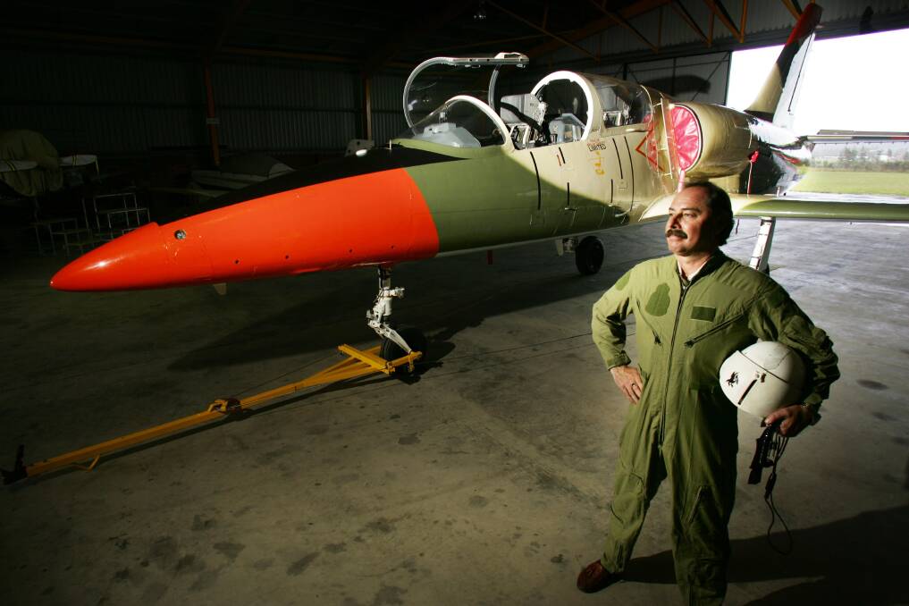 BIG PLANS: Phil Unicomb with his L-39 Albatros at Cessnock Airport in 2005, who moved on from conducting joyflights from the site in 2009. Picture: Peter Stoop