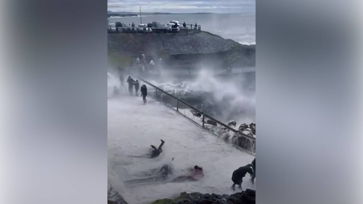 Onlookers were knocked over by a huge sea spray at Kiama Blowhole on Saturday, April 2 with the South Coast forecast for more wet weather this week. Picture: James Hillier, TikTok.