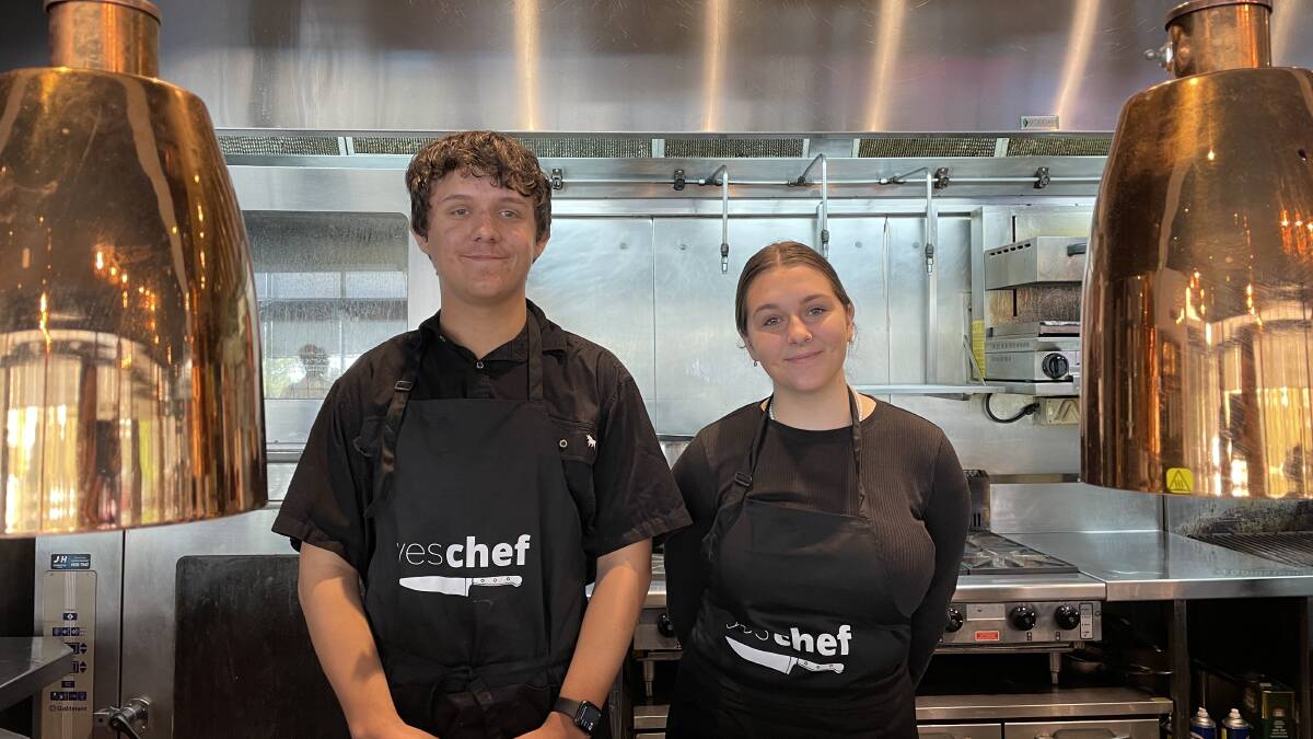Dungog High School student Sam Knowles, 16, and Rutherford Technology High School student Kimberley Lowe, 17 in the Rydges kitchen. Picture by Chloe Coleman