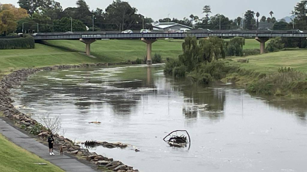 The Hunter River at Belmore Bridge on Tuesday morning. Picture by Michael Hartshorn