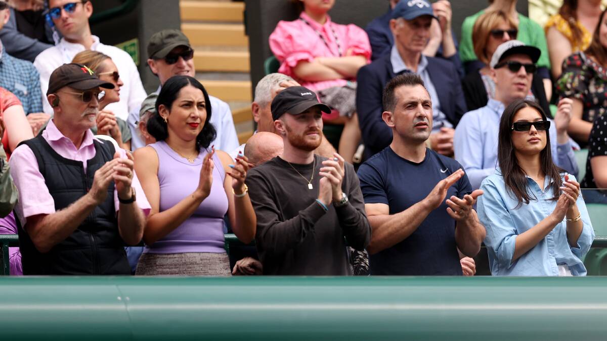 Nick Kyrgios' physiotherapist Will Maher is seen in his player's box at Wimbledon, second from the right. Picture: Getty Images