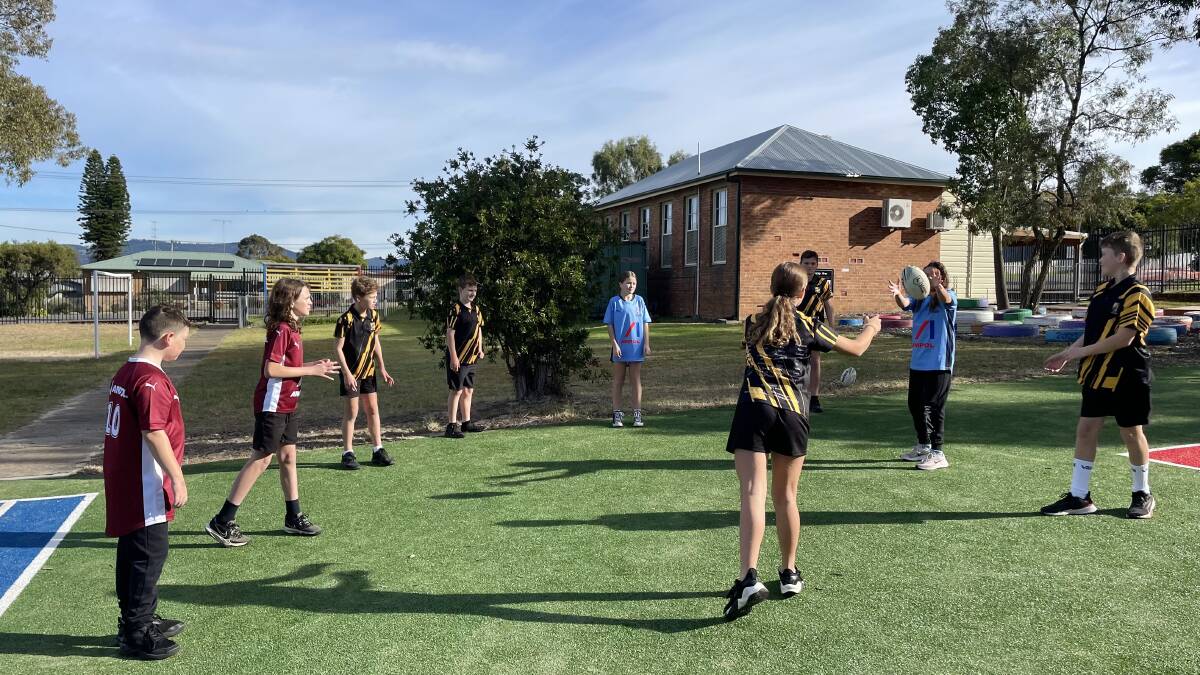 A group of 10 students from Cessnock public school will show off their rugby league skills at half-time at the State of Origin 3 game. Picture by Laura Rumbel