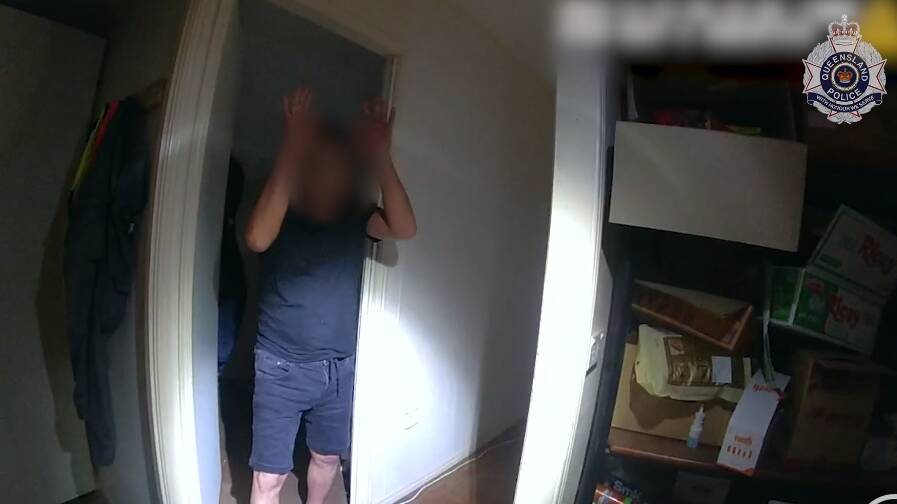 Bodycam footage shows police arresting grow house suspects. Picture via QLD Police