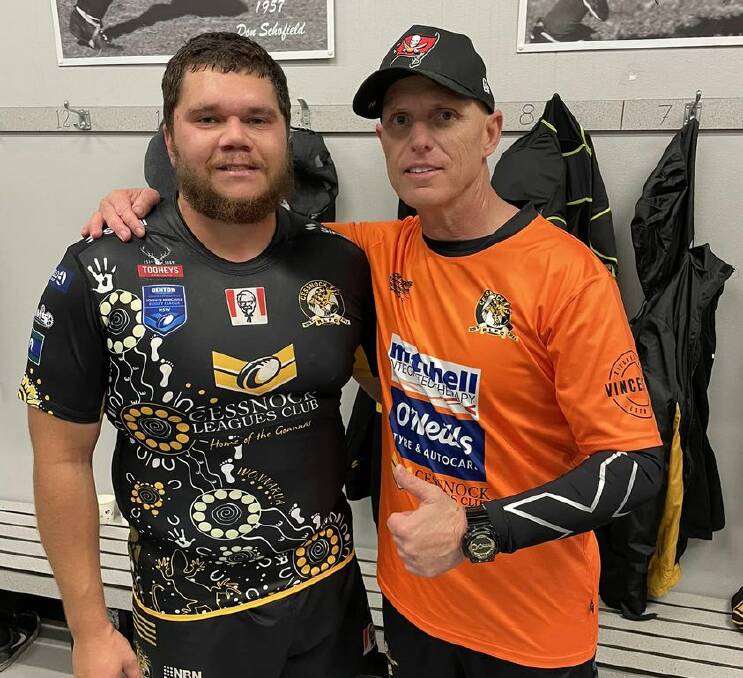 Doug Beale, left, wearing the Indigenous round jersey designed by his partner Brittany Briggs. Picture supplied