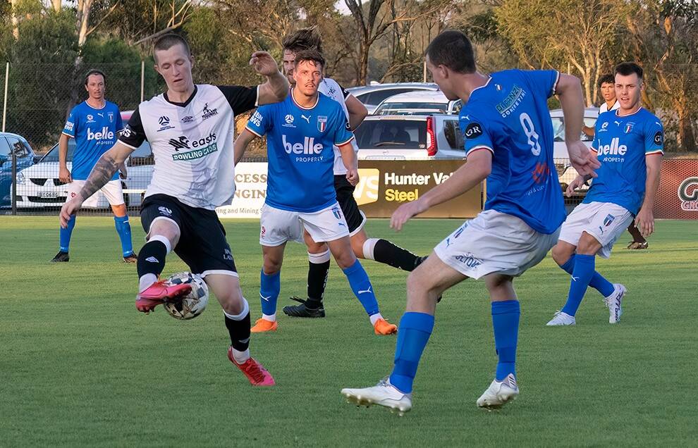 Magpies co-captain Braedyn Crowley (left) controls the ball against Charlestown Azzuri at Cooks Square Park on Saturday, March 18. Picture by Graham Sport and Nature Photography