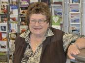 Marj Wotherspoon in her volunteer role at the Kurri Kurri Visitor Information Centre. Picture file