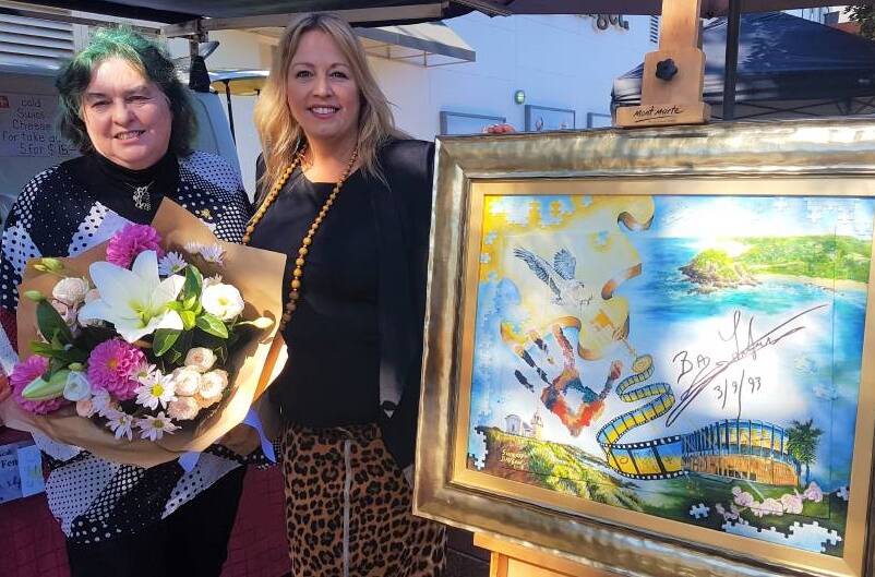 DONATED: Cessnock artist Sharon Davson and Port Macquarie- Hastings Council mayor Peta Pinson at the unveiling at the Glasshouse Regional Art Gallery.