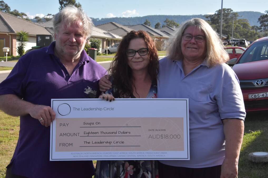 HELPING HAND: Soupz On volunteers Wayne Dowling with Miranda Dunn and Rosie Dowling with the donation cheque, which will help them find their permanent home.