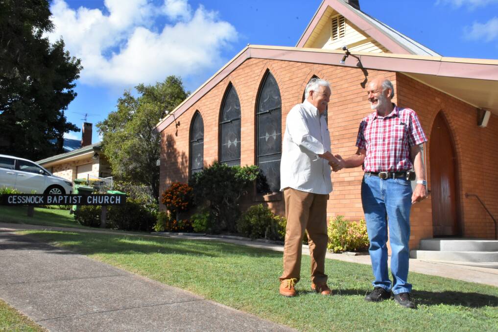 COMMUNITY CORNERSTONE: New pastor Alan Cossgrove and Les Wells at the new Cessnock Baptist Church, which was previously the Presbyterian Church.