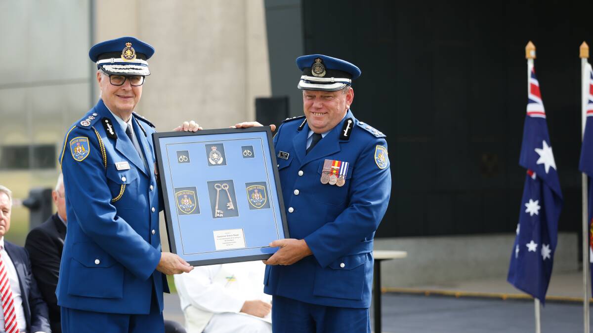 COMMISSION: Corrective Services NSW Commissioner Peter Severin with Shortland Correctional Centre Governor Simon Raper at the ceremony on Monday. Picture: Jonathon Carroll