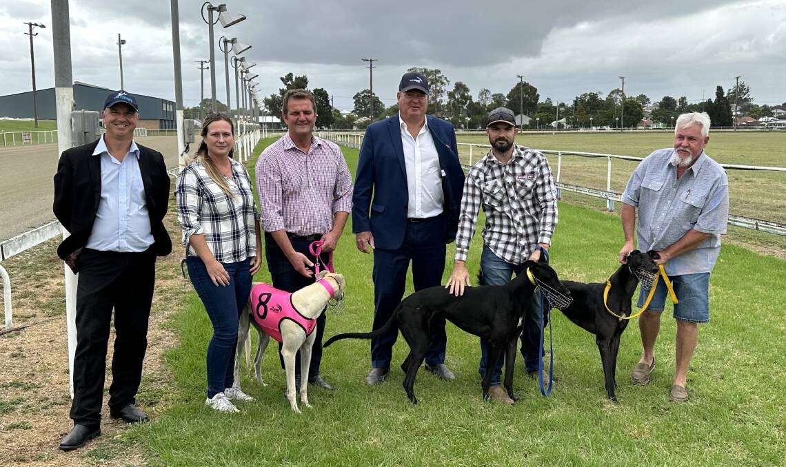 Cessnock MP Clayton Barr (centre left) and Greyhound Racing NSW chief executive officer Rob Macaulay (centre right) with trainers at newly opened Cessnock trial track on Tuesday, March 21. Picture supplied.