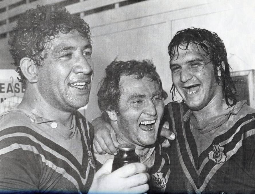 GRAND DAY: Cessnock captain coach Henry Tatana and players John Fairns and Peter Davies celebrate after winning the 1977 grand final against Maitland.