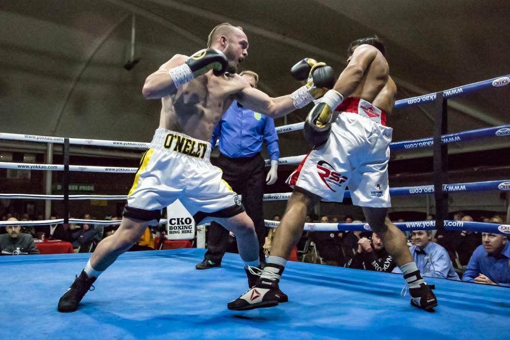 TOUGH: Troy O'Meley goes on the attack during his fight against Indian boxer Sagar Narwat. Picture: Ness Sapsford, Total Fitness