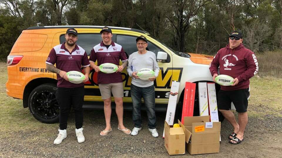 TRAINING BOOST: KO-FM and Rebel Sport donated training equipment to help the Abermain Hawks after their club rooms were destroyed by fire.